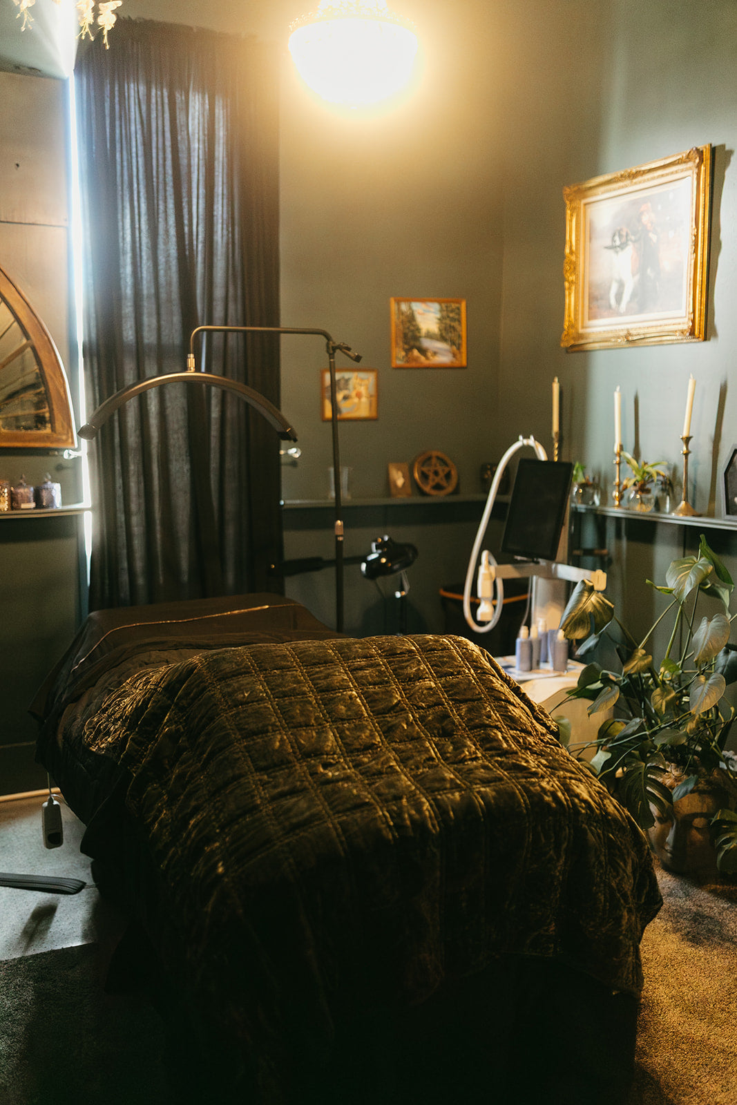 Treatment room at the skin sanctum in Denver Colorado lit with golden light