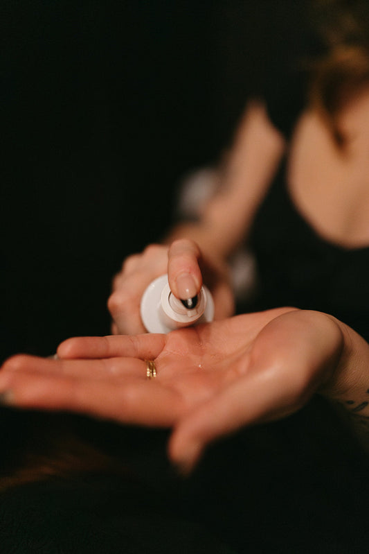 Acne Facials in Denver being customized during treatment by choosing products
