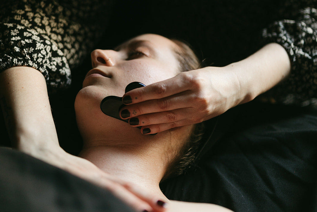 Gua sha facial massage at the skin sanctum in denver